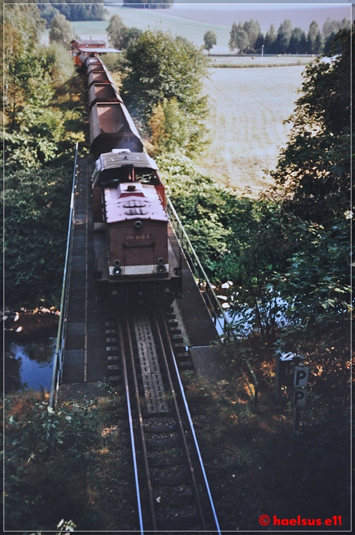 Leergüterzug zur Schotterverladung nach Mohsdorf kurz vor der Einfahrt in den Diethensdorfer Tunnel 